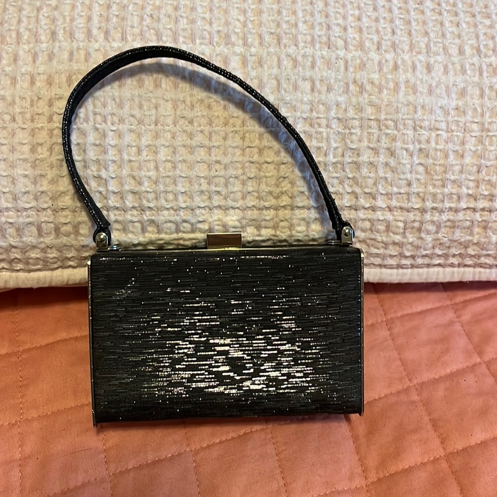 Vintage mini purse, hard sided, black and shiny silver, includes a long chain